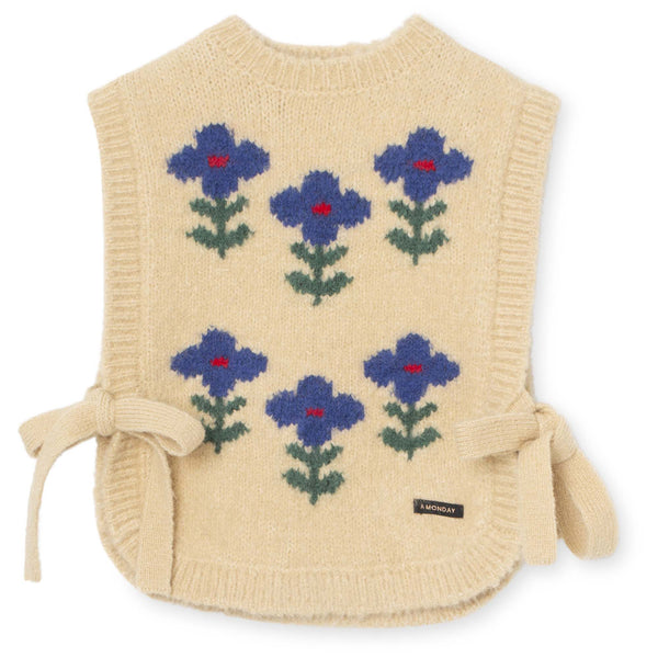 Gebreide debardeur 'Norah Vest'met bloemenprint en strikbanden aan de zijkanten, perfect voor over een jurk of blouse van A Monday in Copenhagen. | Verkrijgbaar bij Little Fashion Addict