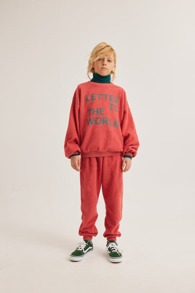 Unisex rode sweater met 'Letter to the World' print, biologisch katoen | Ontdek Letter To The World bij Little Fashion Addict