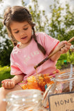 Zacht T-shirt voor meisjes in Summer Sorbet kleur met roze 'PINK LADY' print uit de Sorbet Sunday Collectie van Sproet & Sprout. |  Verkrijgbaar bij Little Fashion Addict